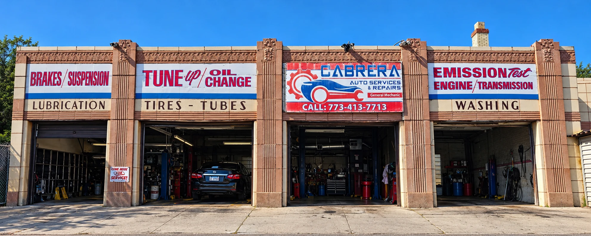 The full Cabrera Auto Services building and four service bays in Chicago